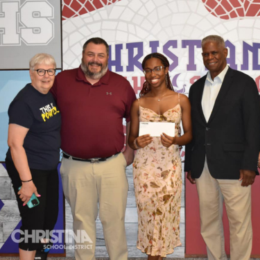 Photo of Christiana Graduate Queenesther Nyah who was awarded the NAACP Gary Hayman Scholarship.
